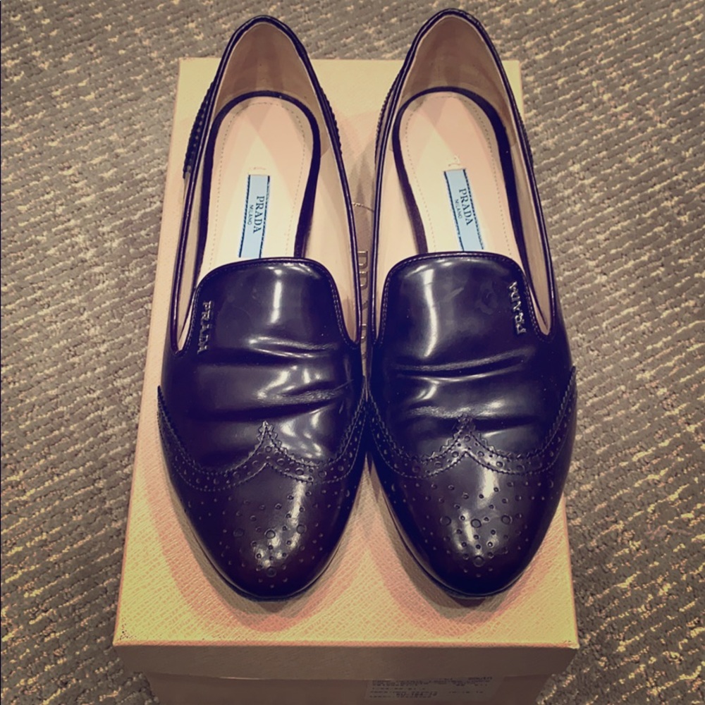 Beautiful class Prada loafers.